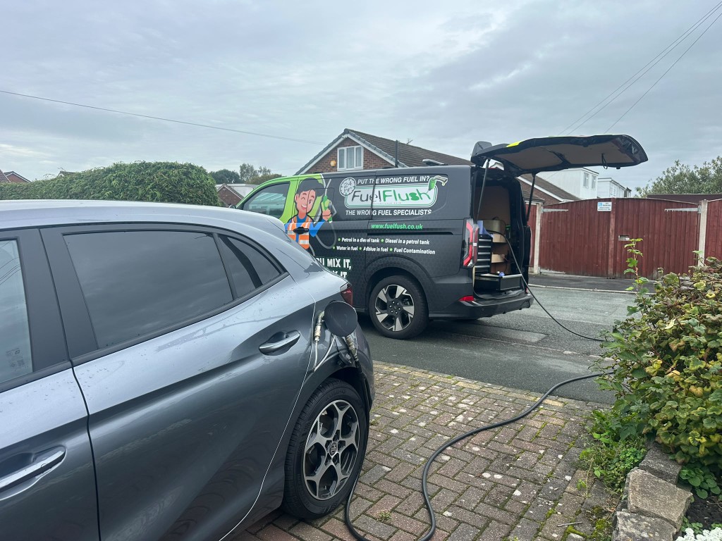 Fuel Flush Mobile Emergency Fuel Drain Van Operating on Roadside